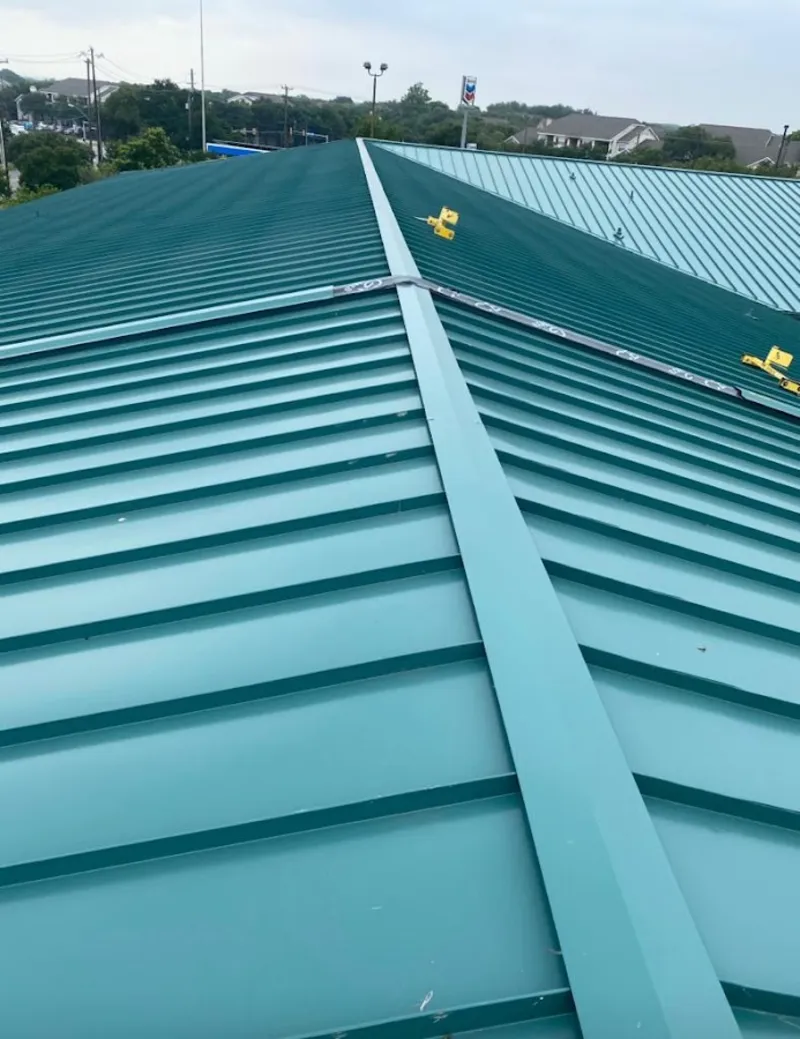 Green commercial metal roof ridge and valley for Metal Roof Repair in Kochville